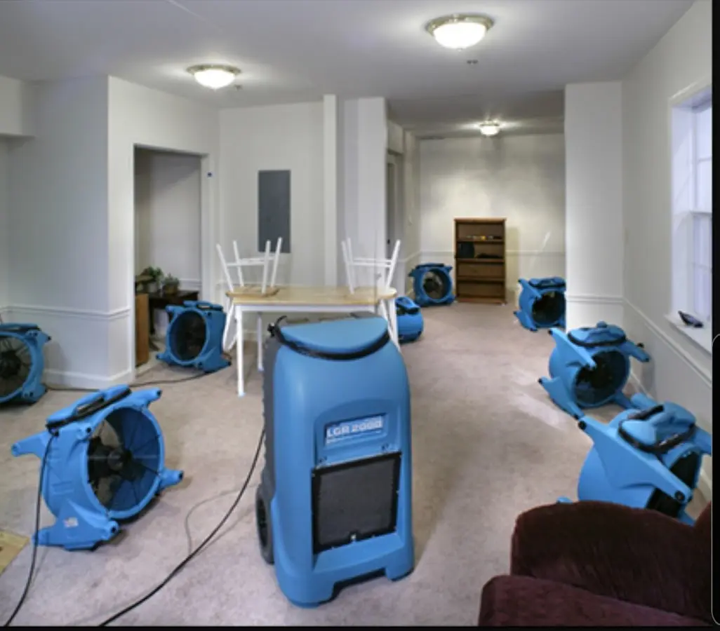Air movers and dehumidifier setup for Water Damage Restoration in Bowie